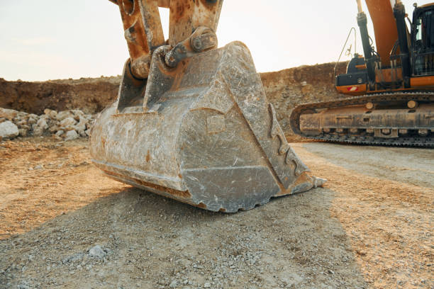 istock No people. Loading vehicle is outdoors on the borrow pit at daytime 1370113328