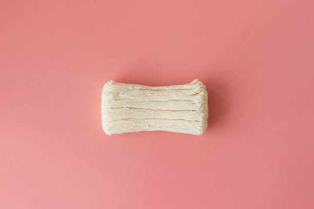 istock Dried cracked soap on a pink background. Empty space for the text. 1370115345