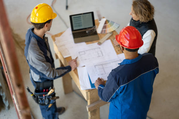 istock Group of people checking drawings and documents 1370116726