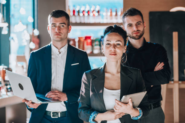 istock Modern business people with tablet and laptop 1370127168