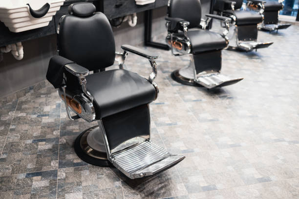 istock Retro armchairs in a men's barbershop 1370130291