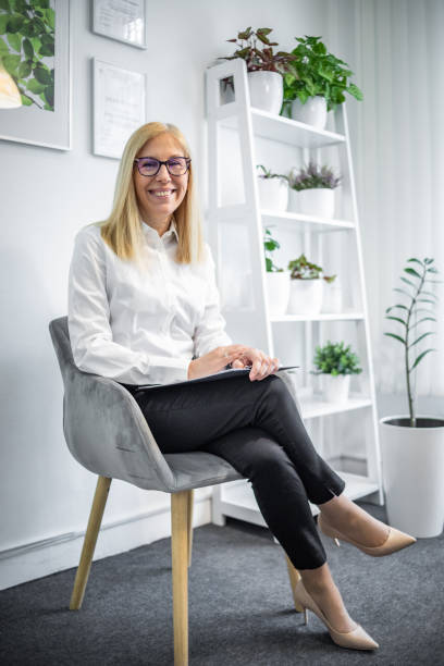 istock Happy relaxed confident young businesswoman 1370131149