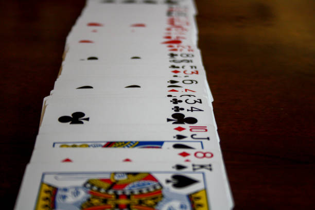 istock Straight row of playing cards 1370131759