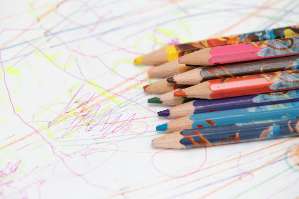 istock Back to school with colored pencils on the table 1370138704