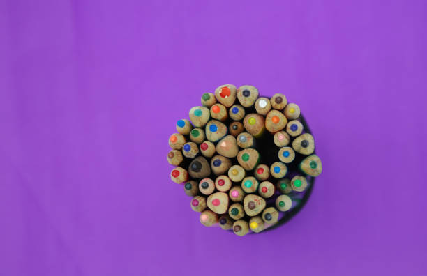 istock Back to school with colored pencils on the table 1370138746