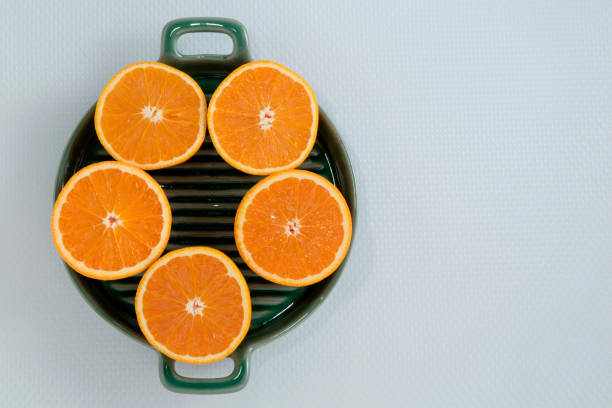 istock Food healthy orange fruit on white table. 1370142682