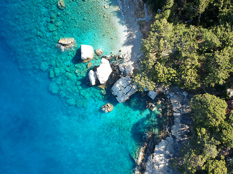 Turquoise water of Mediterranean sea and road, Turkey. Lycian way