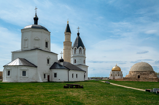 Assumption Church, a large minaret, a memorial sign in honor of the official adoption of Islam by the Volga Bulgars and the Northern Mausoleum. Bolgar, Republic of Tatarstan, Russia