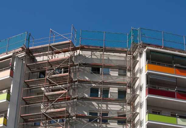 istock construction scaffolding on the side of a building 1370148075