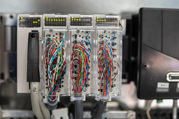 A closeup shot of electronics controllers. Electronic PLC