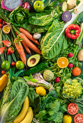 Fruits and vegetables assorted full frame background featuring many leaf vegetables