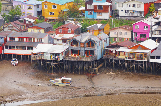 istock Houses by the water edge at low tide time. 1370150237