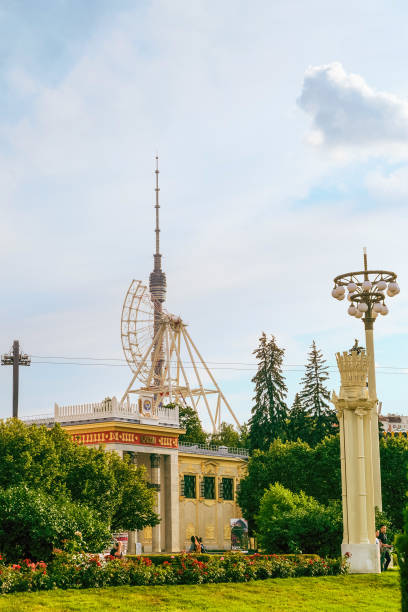 Moscow, Russia - July 21, 2021: Pavilion number 4 - Trade and Exhibition Center of the Kyrgyz Republic. VDNH park. Ostankino television tower in the background.