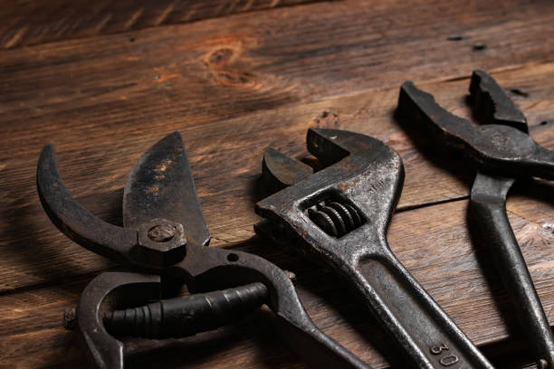 istock Dirty set of hand tools on a wooden boards 1370157960