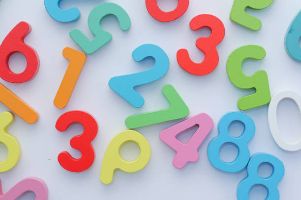istock colorful plastic letters on white background, close up 1370158323