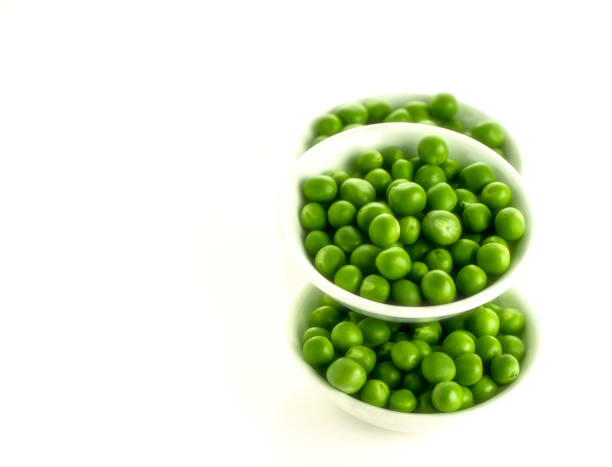 istock Bowls Of Green Pea On White Bord 1370161630