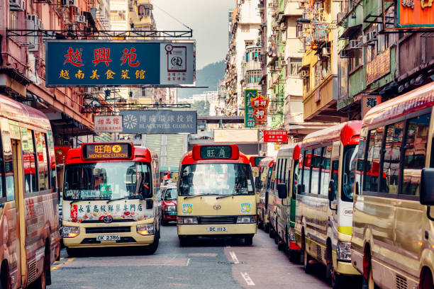 Street Scene with busses in Hongkong Hong Kong, China - October 20, 2019: Street Scene with busses in Hongkong, China mong kok stock pictures, royalty-free photos & images