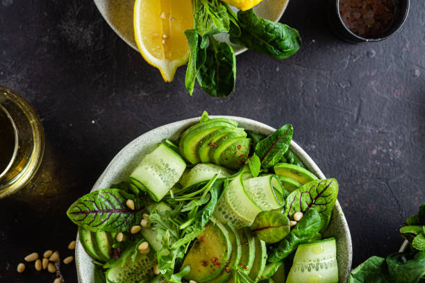 istock Vegetarian salad with avocado, cucumber and herbs 1370164569