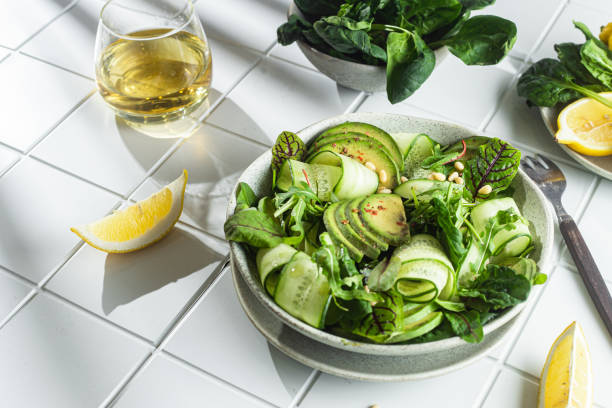 istock Vegetarian salad with avocado, cucumber and herbs 1370165339
