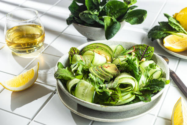 istock Vegetarian salad with avocado, cucumber and herbs 1370165340