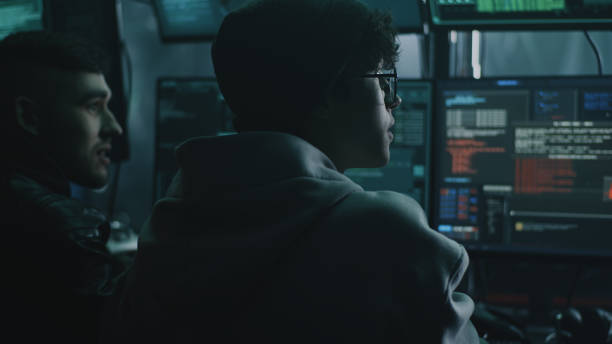 istock Male criminals discussing hacker attack 1370166764