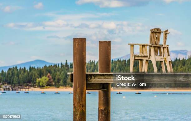 Boat Dock With Wooden Chairs On Lake Tahoe Stock Photo - Download Image Now - South Lake Tahoe, Lake Tahoe, Tranquility