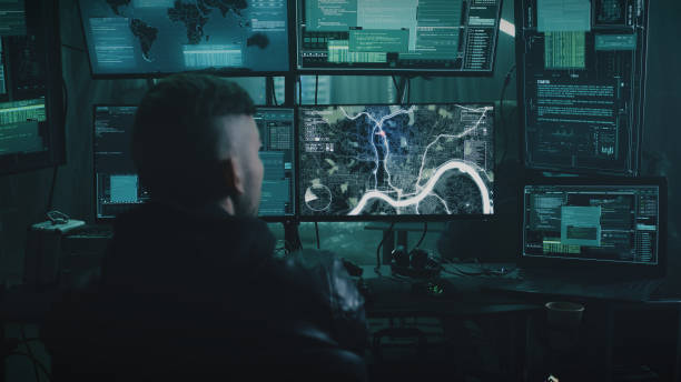 istock Team of hackers spying on people 1370171648