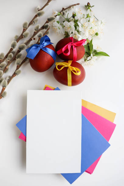 istock colorful Easter eggs, willow twigs and spring flowers 1370174884