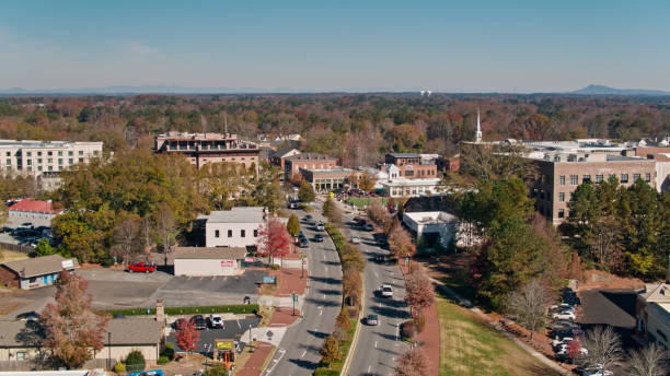 istock Traffic Driving Through Alpharetta, Georgia - Aerial 1370183879