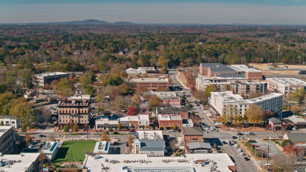 istock Downtown Alpharetta and Tree-Covered Georgia Landscape in Fall - Aerial 1370183899