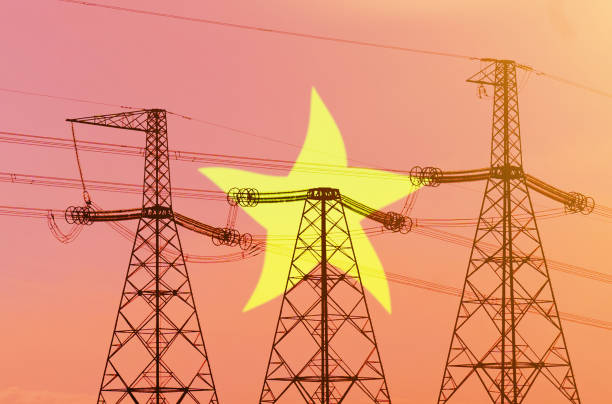 istock Double exposure - power line, tower and flag Vietnam 1370184043