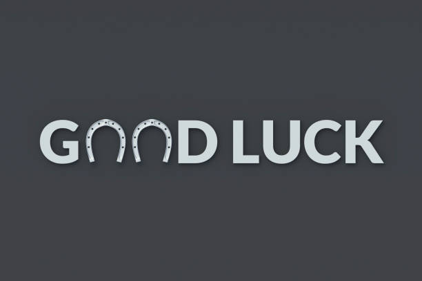 istock Word good luck with silver horseshoes on a gray background. 3d render 1370184111
