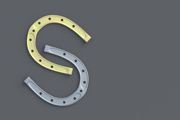 golden and silver horseshoes on a gray background. symbol of luck. successful concept. top view. copy space. 3d render - horseshoe good luck charm cut out luck imagens e fotografias de stock
