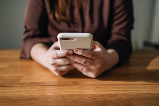 istock An Anonymous Plus Size Businesswoman Working on her Mobile Phone from Home Office Desk 1370185363
