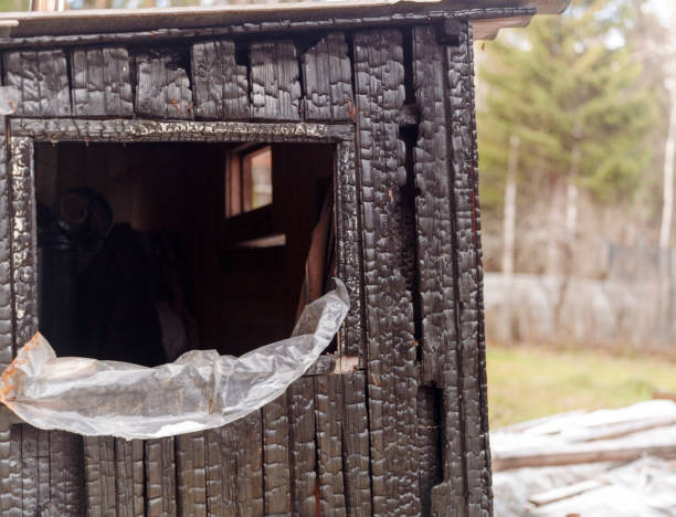 istock burn out wooden shed 1370188259