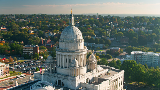 Aerial shot of the state capitol building in Providence, Rhode Island on a sunny morning in early Fall.