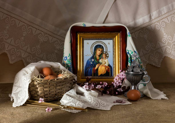 Easter composition on the table close-up Easter composition on the table. Eggs, candles, flowering branches, the icon of the Mother of God and incense close-up orthodox church easter stock pictures, royalty-free photos & images