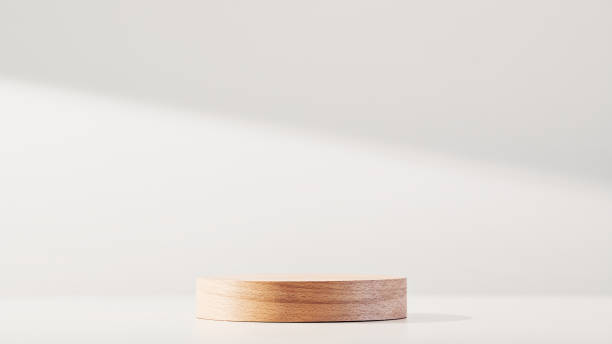 istock Round wooden podium on a white background 1370191235