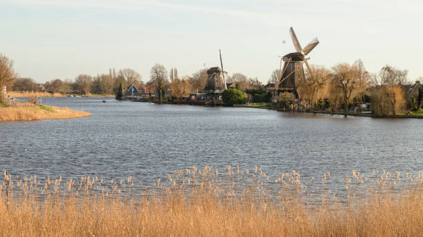 istock Windmills along the Dutch river Vecht. 1370192485