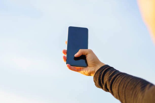 istock Unrecognizable young woman taking a selfie with a smartphone 1370192652