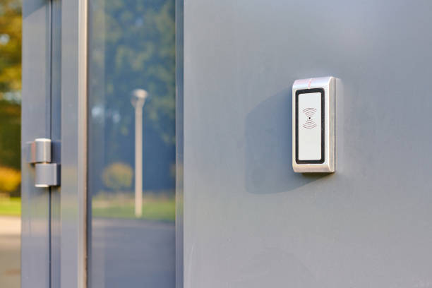 istock RFID reader by office door, employees only access by RFID key card, lock and key control system 1370192754