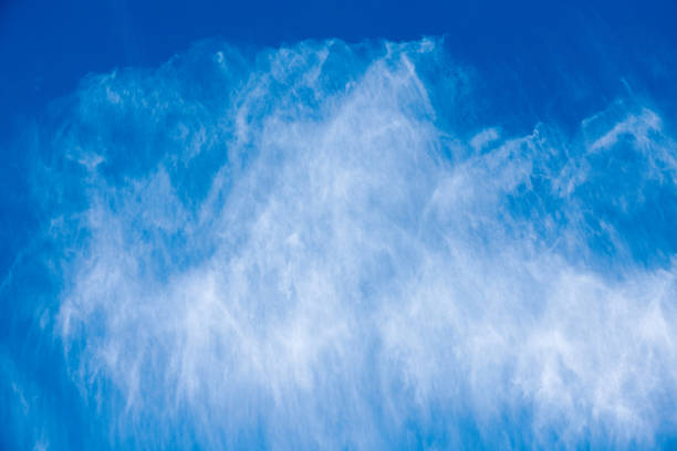 Cirrus clouds on blue sky, beautiful bright cloudscape. Beautiful cirrus white clouds on blue day sky. Short detached cloudy weather nature background