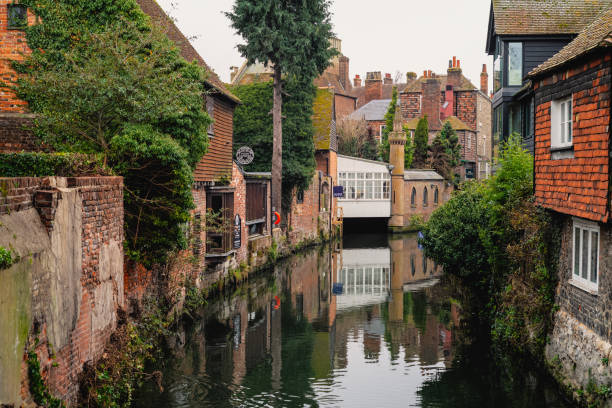 The river Stour running through the historic city of Canterbury Canterbury, UK - Feb  11 2022 The river Stour running through the historic city of Canterbury canterbury england stock pictures, royalty-free photos & images