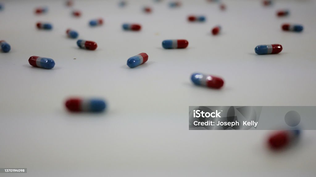 Acetaminophen Pain Relief Pills Spinning Over White Acetaminophen Stock Photo