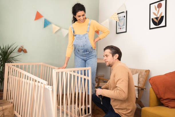 istock Happy future parents preparing for a baby 1370197934