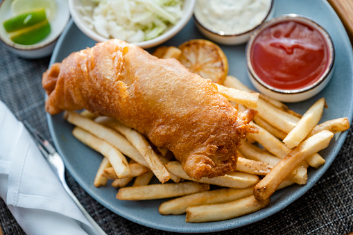 Room service fish and chips. Fresh fish and fries at a restaurant.