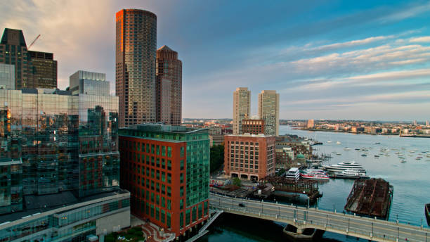 istock Boston Waterfront and Harbor from Over Fort Point Channel at Sunset - Aerial 1370200916