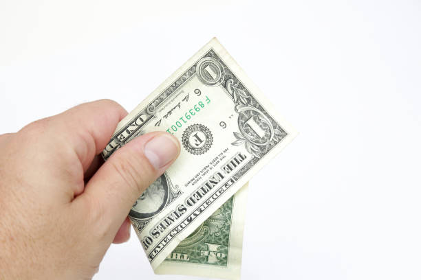 istock Dollars money isolated on white background . 1370201069