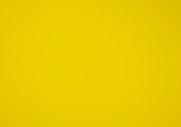 istock yellow paper cardboard, abstract background for designer 1370201669