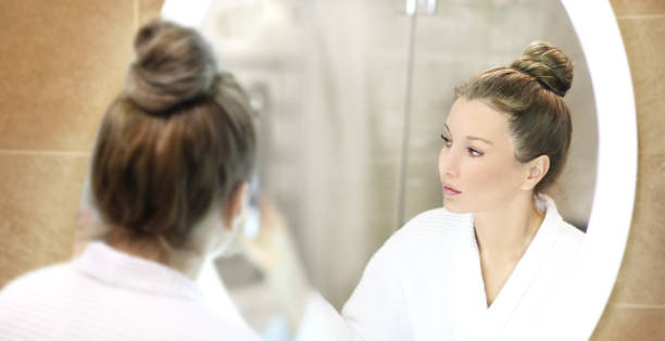 istock Applying the cream.Magic anti-aging cream. 1370201889